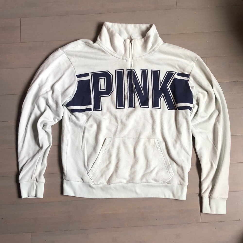 A light blue three quarter zip up.